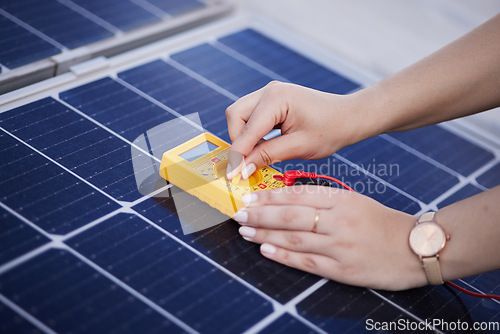 Image of Solar panels, voltage meter and hands for renewable energy, electricity or innovation. Closeup, charge and a person with gear for sustainable lighting, grid or photovoltaic tools for a home generator