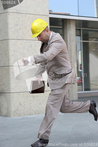 Image of A businessman panic running 