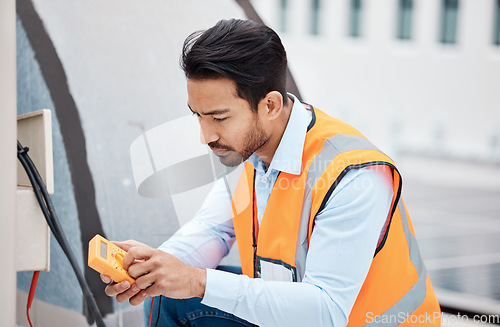 Image of Multimeter, electricity and man with air conditioner for repair, maintenance and inspection on roof. Solar power, construction and male worker with tools for service, installation and engineering