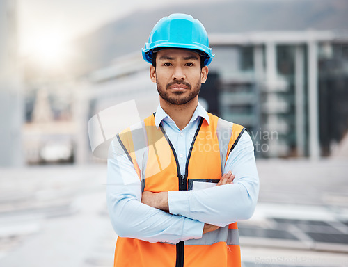 Image of Portrait, construction worker and man with arms crossed with solar panel maintenance outdoor. Roof, eco engineer and green energy project with builder and sustainability contractor ready for work