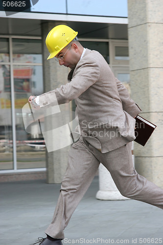 Image of A businessman panic running 