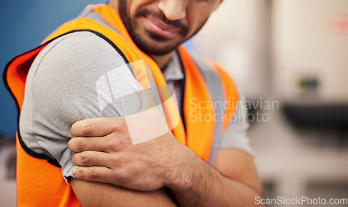 Image of Hand, construction worker and arm pain from building, handyman injury or maintenance stress. Sad, safety and a person with inflammation, medical emergency or a problem while working on a site