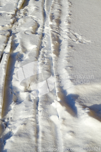 Image of track on a winter road