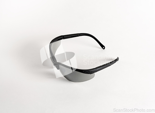 Image of Black mirrored sunglasses.