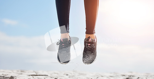 Image of Woman, fitness and shoes in jump on mockup for sports motivation, running or outdoor exercise. Closeup of female person, athlete or runner feet jumping in workout for healthy wellness or training