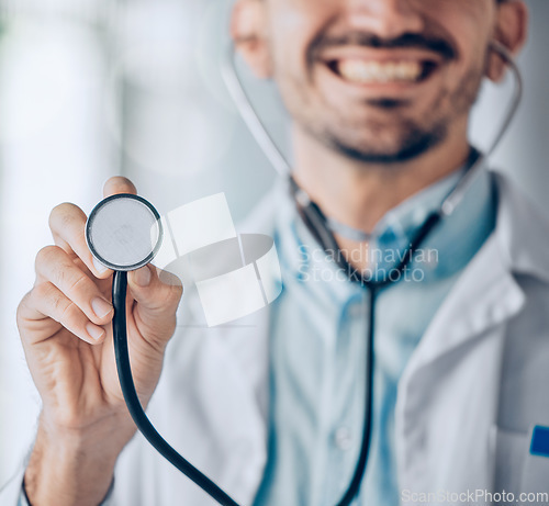 Image of Man, doctor and hands with stethoscope for heart beat, checkup or consultation at the hospital. Closeup of male person, nurse or surgeon with medical tool for monitoring or listening at the clinic