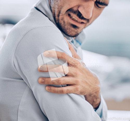 Image of Man, doctor and hands with arm pain, injury or inflammation in healthcare accident at the hospital. Frustrated male person or medic with sore muscle, tension or pressure in discomfort at the clinic