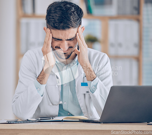 Image of Frustrated man, doctor and headache in stress, mistake or debt from burnout, pain or deadline at the hospital. Male person or medical employee in anxiety, depression or mental health at the clinic