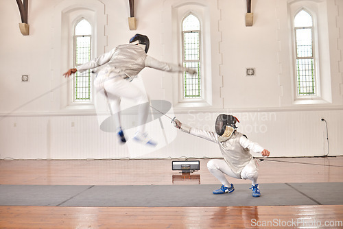 Image of Fencing, exercise and people battle, jump and training, fitness or workout for energy with epee sword in club. Fight, fencer or athlete in performance, competition or sports with mask, helmet or suit