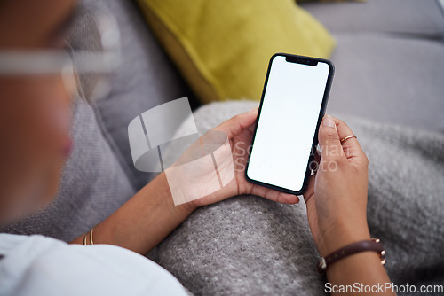 Image of Screen, mockup and hands of woman with phone on a couch for ux, internet and web search on social media. Website, smartphone and person relax on a sofa with mobile connection or online shopping