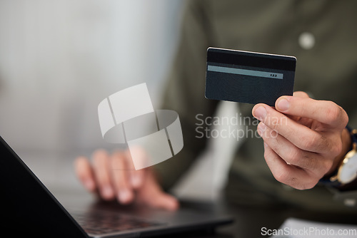 Image of Hands, credit card and laptop with typing in office for password, cybersecurity and payment for e commerce. Person, fintech and computer for finance, saving or online shopping with deal in workplace
