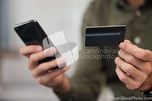 Image of Hands, credit card and phone with typing in office for password, cybersecurity and payment for e commerce. Person, fintech and smartphone for finance, saving or online shopping with deal in workplace