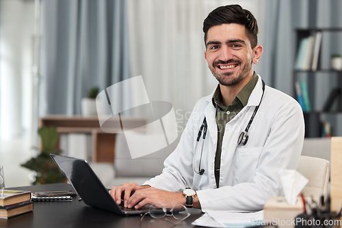 Image of Laptop, office and portrait of doctor typing or working on research or search the internet, online or web for results. Medical, service and professional young healthcare worker doing a report