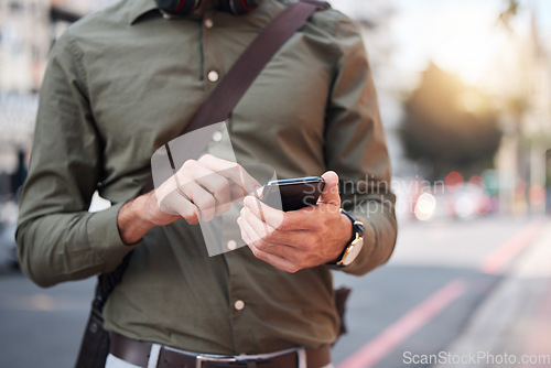 Image of Phone, hand and man typing in a street, contact and location with navigation, network and social media. Smartphone, person and male online for app, directions and guide with internet, city or outdoor