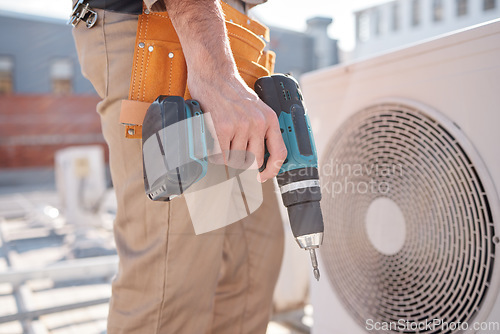 Image of Hands, man and outdoor for air conditioner maintenance, roof and building in city, drill or construction. AC repair, hvac system and tools for engineer, technician or expert in ventilation on rooftop