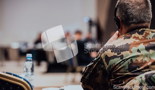 Image of Photo of a soldier leading a seminar for professional training of military personnel