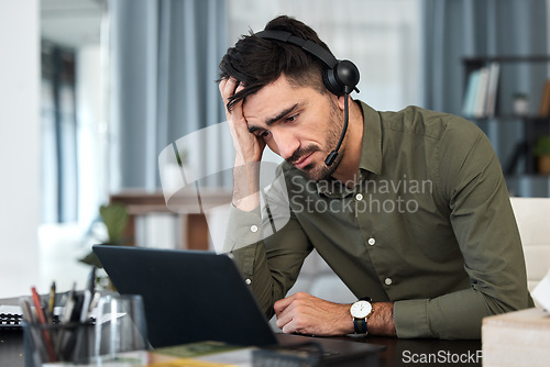 Image of Frustrated, man and working in a call center on laptop and sad businessman with fatigue, tired and burnout in office. Consultant, computer and customer service, advice and depressed with email