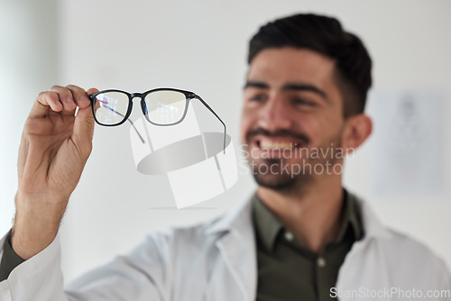 Image of Hands of man, doctor and optician with glasses for vision, eyesight and prescription eye care. Happy optometrist check frame of lens for eyewear, test and consulting for optical healthcare assessment