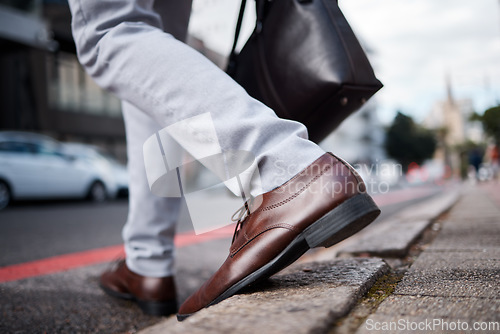 Image of Feet, business man and walking on city road or ground for travel, journey and commute to work. Shoes, legs and closeup of a professional person or employee crossing an urban street with a bag