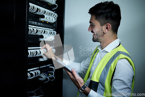Image of Technician, check server cables and tablet with system, happy or maintenance on web app in night. IT expert man, engineer and digital touchscreen for inspection, idea or smile in room for data center