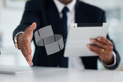 Image of Handshake, meeting and a businessman with a tablet at work for an interview or company onboarding. Thank you, hr and a manager or employee extending a hand for welcome with technology for recruitment