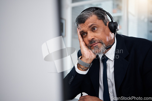 Image of Stress, call center agent and man at computer in telemarketing agency with fail, telecom error and 404 glitch. Bored, mature and confused salesman with challenge, client account problem or CRM crisis