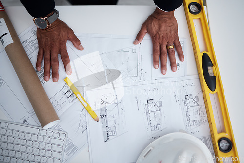 Image of Top view of man, hands and architect with blueprint, project illustration and engineering process. Closeup of designer with documents, floor plan and stationery tools to sketch planning of buildings