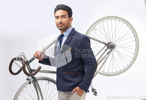 Image of Business man, bicycle and studio portrait with retro suit, sustainable transport or pride by white background. Young entrepreneur, vintage fashion and bike for travel, transportation and eco friendly