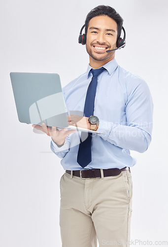 Image of Laptop, call center and Asian man in portrait for customer service, crm support or contact us isolated on a white studio background. Computer, smile and sales agent, happy consultant or telemarketing