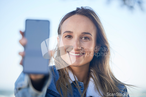 Image of Phone, screen and outdoor portrait of woman with social media, blog or post online with network connection and contact. Smartphone, communication and person with mobile app, internet and happiness