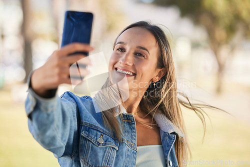 Image of Happy selfie, outdoor nature and woman pose for memory picture, post to social network and smile on video call communication. Happiness, photography or person update online photo of media application