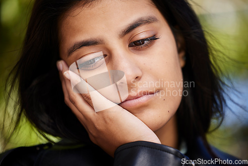 Image of Sad, thinking and mental health with woman in nature for depression, stress and confused. Fear, frustrated and crisis with face of person feeling lonely in outdoors for tired, mistake and problem