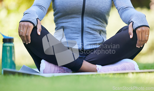 Image of Yoga meditation, legs or nature person meditate for spiritual healing, chakra energy balance or park freedom. Closeup body, hands or zen yogi relax for mindfulness, mindset or wellness or grass field