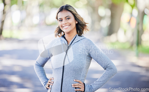 Image of Park, fitness and face portrait of a woman in nature for an outdoor workout or training. Sports, confident and young female athlete ready with a smile for a running cardio exercise in garden.