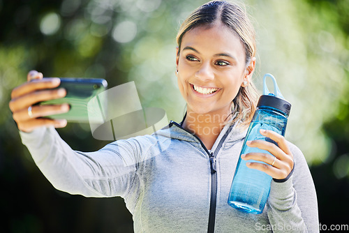 Image of Runner woman, selfie and smile in park for memory, blog update or post with exercise, fitness or training. Influencer girl, happy and photography for wellness, health or workout on social network app