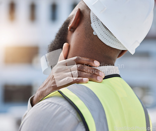 Image of Engineer, outdoor and man with neck pain, injury and stress with burnout, contractor and builder with a helmet. Tired, architect and employee with accident, health problem and emergency with tension