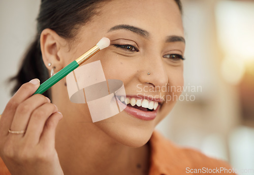 Image of Brush, makeup and woman with a smile, beauty and skincare with dermatology, self care and happiness. Person, happy and girl with cosmetic tool, eyeshadow for facial treatment and applying product