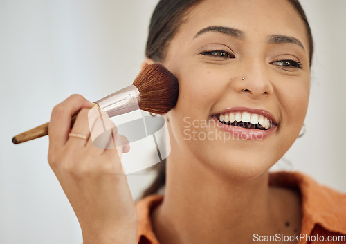 Image of Brush, makeup and woman with a smile, beauty and cosmetology with self care, applying product and happiness. Person, skincare and girl with cosmetic tool, foundation for facial treatment and happy