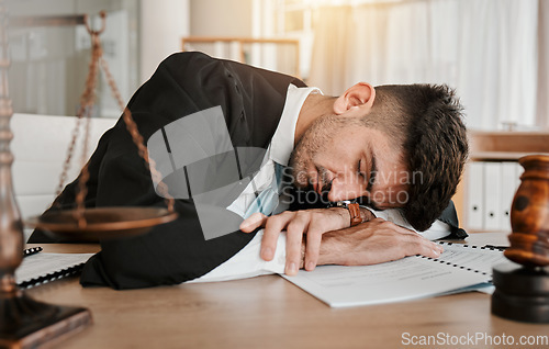 Image of Judge, sleeping and office man tired after working on legal paperwork, court documents or advocate justice. Government, law firm lawyer and male attorney fatigue, dream and burnout after policy work