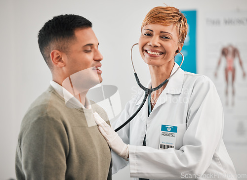 Image of Doctor, portrait or happy woman with man breathing for healthcare, nursing or clinic cardiology. Wellness services, smile or medical worker checking heart beat with listening equipment in hospital