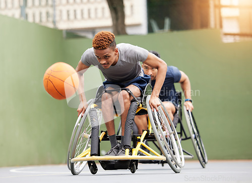 Image of Sports, basketball game and men in wheelchair in action for training, exercise and workout on outdoor court. Fitness, team and male people with disability and ball for match, practice and games