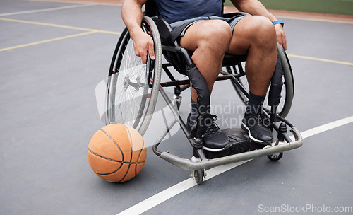 Image of Wheelchair, sports and man with basketball at outdoor court for fitness, training and cardio. Exercise, closeup and person with disability at a park for game, workout and weekend fun or active match