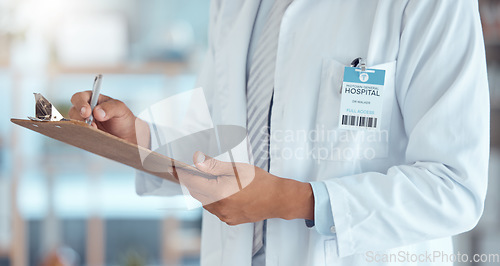 Image of Person hands, doctor and clipboard writing for hospital schedule, surgery planning or healthcare checklist. Paper, documents or life insurance information on medical aid, prescription or test results