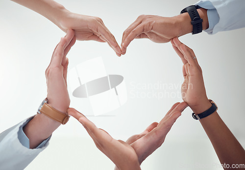 Image of Heart, teamwork or hands of doctors with support in collaboration for healthcare wellness together. Closeup, love shape or medical nurses with group solidarity, integrity or mission with mockup space