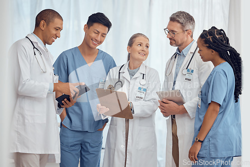 Image of Group of happy doctors, nurses and checklist in hospital, meeting and planning surgery or team schedule. Healthcare, discussion and medical staff with smile, feedback and talking together in clinic.