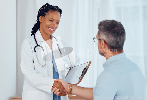 Image of Doctor, patient and people shaking hands, smile and hospital checkup with healthy diagnosis, healthcare results or support. Clinic nurse, trust and surgeon welcome, thank you or hand shake for client