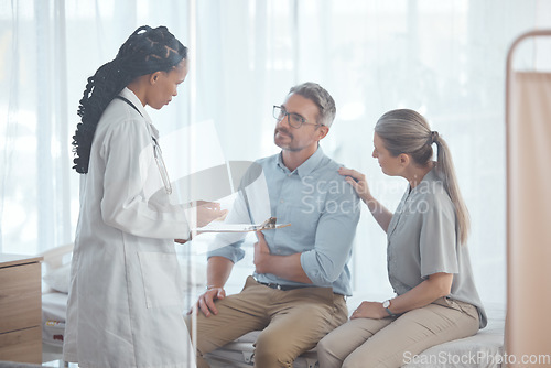 Image of Doctor, couple or people in hospital consultation, medical checkup or healthcare exam, patient diagnosis or health advice. Husband support, clinic assessment or talking surgeon in client conversation