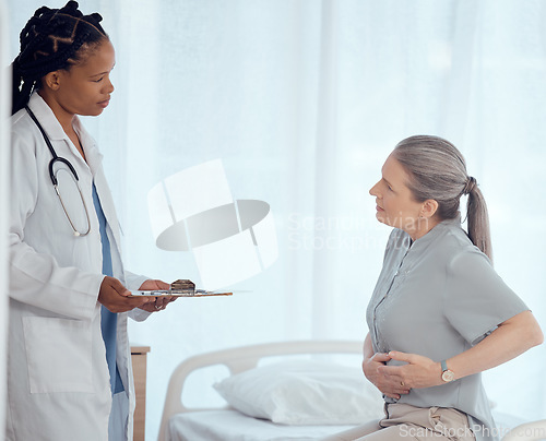 Image of Medical, consultation and doctor with mature patient in discussion on chest pain problem. Professional, clipboard and female healthcare worker talking to elderly woman with heart sickness in hospital