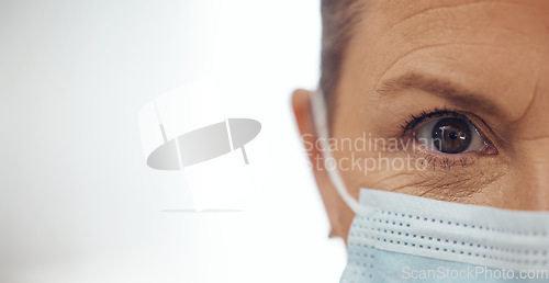 Image of Healthcare, portrait and woman with mask, mockup banner and safety for doctor in hospital on white background. Ppe, face and eyes of medical professional, rules and compliance working in clinic space