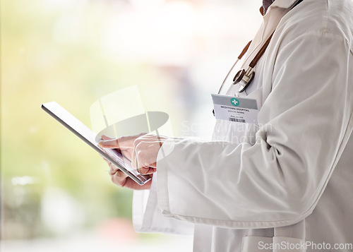 Image of Tablet, doctors and hands for online healthcare management, hospital software or research. Closeup of medical professional, digital technology and wellness services for telehealth, data review or app